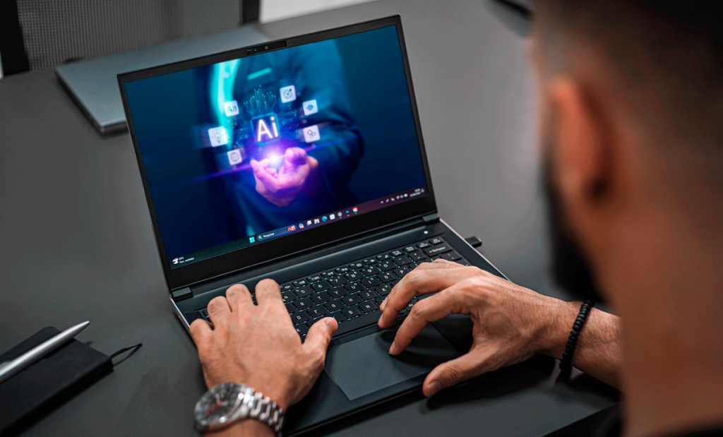 Pessoa usando notebook com imagem digital de inteligência artificial generativa na tela, representando tecnologias de IA e inovação digital